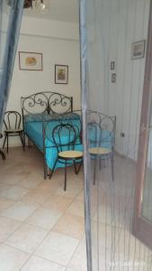 Ένα ή περισσότερα κρεβάτια σε δωμάτιο στο Agriturismo La Favella