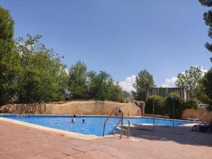 Bazén v ubytování Apartamento Granada Bola de Oro nebo v jeho okolí