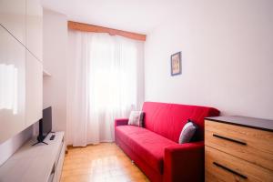 TV a/nebo společenská místnost v ubytování Residenza Garibaldi