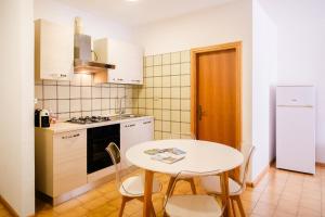 Kuchyň nebo kuchyňský kout v ubytování Residenza Garibaldi