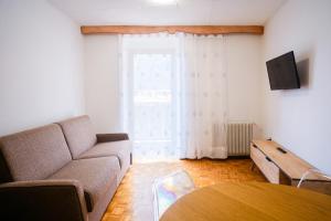 TV a/nebo společenská místnost v ubytování Residenza Garibaldi