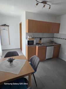 Kuchyň nebo kuchyňský kout v ubytování Apartments Žegarac House
