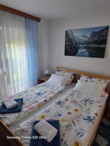 Postel nebo postele na pokoji v ubytování Apartments Žegarac House