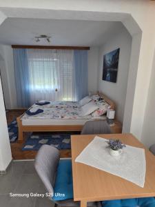Postel nebo postele na pokoji v ubytování Apartments Žegarac House