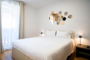 Postel nebo postele na pokoji v ubytování Residenza Garibaldi