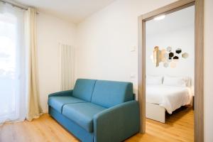 Postel nebo postele na pokoji v ubytování Residenza Garibaldi