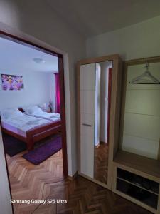 Postel nebo postele na pokoji v ubytování Apartments Žegarac House