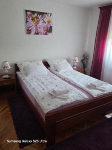 Postel nebo postele na pokoji v ubytování Apartments Žegarac House