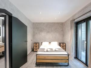 Posteľ alebo postele v izbe v ubytovaní Demi-chalet cosy avec terrasses, WiFi et parking à Chamonix - FR-1-343-228