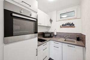 Kuchyň nebo kuchyňský kout v ubytování Schwarzwald-Oase mit Balkon und Parkplatz