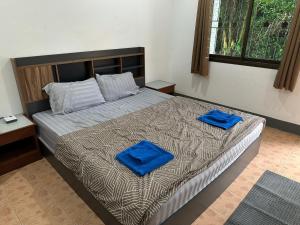 Ένα ή περισσότερα κρεβάτια σε δωμάτιο στο Bestin Karon 2