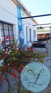 a building with a painting on the side of it at Von Loë Huizen in Fauresmith