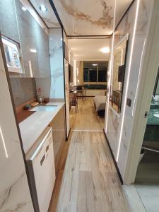 a kitchen and dining room of an rv at מגדל premium C in Netanya