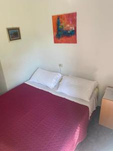 Postel nebo postele na pokoji v ubytování B&B LOKEV Sezana