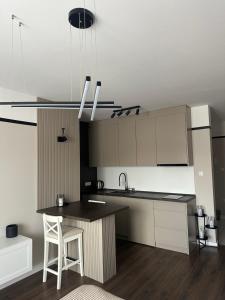 A cozinha ou kitchenette de Premium Line Apartman 3
