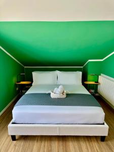 Postel nebo postele na pokoji v ubytování Catullo Loft Near Verona
