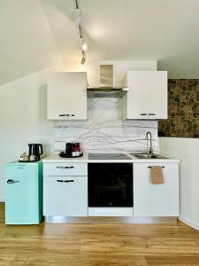 Kuchyň nebo kuchyňský kout v ubytování Catullo Loft Near Verona + 14 fotografií