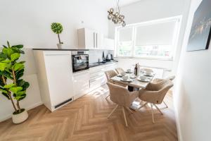 Η κουζίνα ή μικρή κουζίνα στο Suite am Tor - Zentral im Viertel - Modern & groß +11 φωτογραφίες