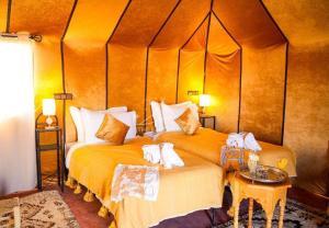 Ένα ή περισσότερα κρεβάτια σε δωμάτιο στο Host Luxury Camp