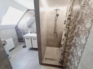 Ένα μπάνιο στο TABÁN Apartman