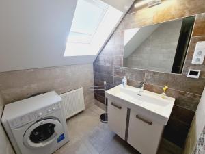 Ένα μπάνιο στο TABÁN Apartman
