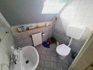 Ένα μπάνιο στο TABÁN Apartman