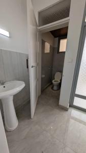 Koupelna v ubytování Bitare Appartements