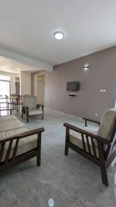 TV a/nebo společenská místnost v ubytování Bitare Appartements