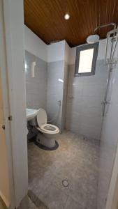 Koupelna v ubytování Bitare Appartements