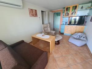 Χώρος καθιστικού στο TABÁN Apartman