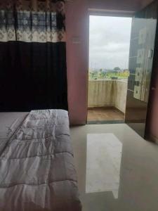 Ένα ή περισσότερα κρεβάτια σε δωμάτιο στο Stay House