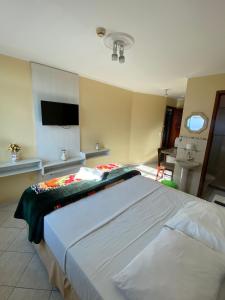 Afbeelding uit fotogalerij van Pousada Emaús in Cruzeiro