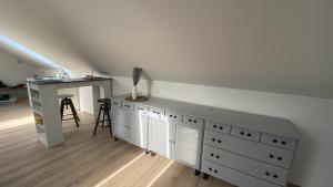 Kuchyňa alebo kuchynka v ubytovaní Borostyán Apartmanház