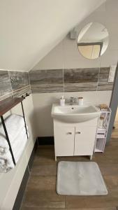 Kúpeľňa v ubytovaní Borostyán Apartmanház