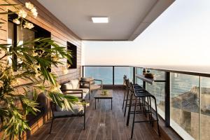 Balkón nebo terasa v ubytování דירת חוף נתניה