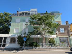 a building on the side of a street at Locanda San Marco in Caorle +40 photos
