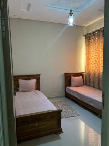 Ένα ή περισσότερα κρεβάτια σε δωμάτιο στο Designer apartment in Agadir