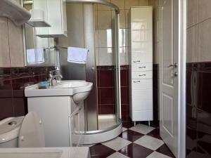 Koupelna v ubytování IVN Apartmani