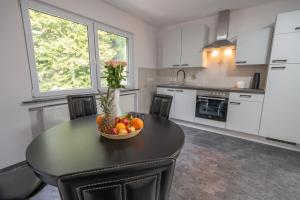 Dapur atau dapur kecil di Ferienwohnung Bad Blenhorst +21 gambar