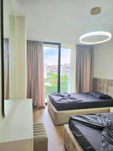 Ένα ή περισσότερα κρεβάτια σε δωμάτιο στο Villa Klesta at San Pietro resort