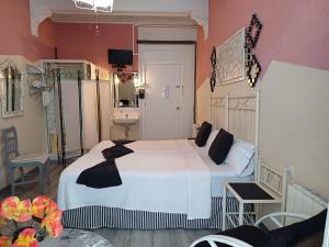 Ein Bett oder Betten in einem Zimmer der Unterkunft Hospedaje Botin