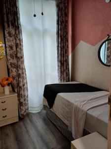 Ein Bett oder Betten in einem Zimmer der Unterkunft Hospedaje Botin