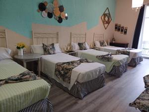 Ein Bett oder Betten in einem Zimmer der Unterkunft Hospedaje Botin