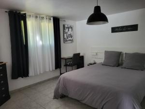 Postel nebo postele na pokoji v ubytování Location gîte dans le var