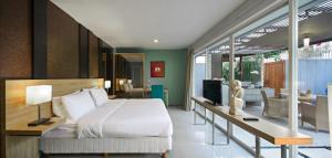 Et tv og/eller underholdning på Bougenvilla Nusa Dua Bali