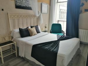 Ein Bett oder Betten in einem Zimmer der Unterkunft Hospedaje Botin