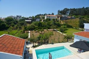 an aerial view of a villa with a swimming pool at Maias House in Figueira da Foz
