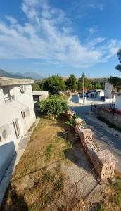 a view of a yard next to a building at Aparmani Family 1 in Sutomore