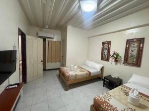Postel nebo postele na pokoji v ubytování Constrell Pension House