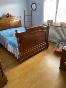 Ένα ή περισσότερα κρεβάτια σε δωμάτιο στο Vintage house Chez la Marcelle